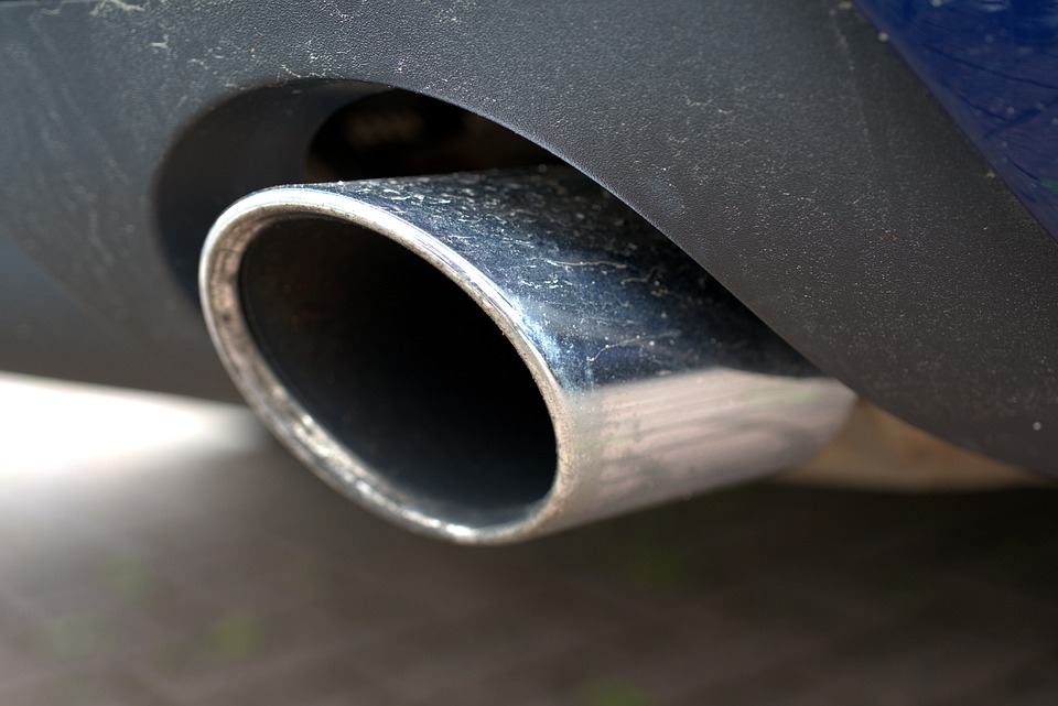 Close up image of a vehicles tailpipe for Darrel's Economy Mufflers Blog Post on Exhaust System Upgrades